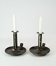 A set of low 
candlesticks of 
Tin, in great 
used condition 
from the 1860s.
17.5 x 17 cm.