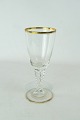 Beer glass 
decorated with 
gilded edge 
from the 1920s.
22 x 9 cm.