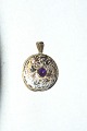 Elegant 
Medallion with 
armatyst in 14 
carat gold
Stamped 585 
GIFA
Height 33.00mm
Width 24.04 
...