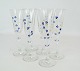 Set fo six 
champagne glass 
decorated with 
blue and gold 
flowers. We 
have 7 in 
total.
21,5 x 6,5 ...