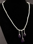 N E From sterling silver necklace 42 cm. with three amethysts