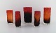 Kaj Blomqvist 
for Kumela. 
Five 
mouth-blown art 
glass vases in 
dark and orange 
shades. Finnish 
...