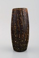 Gunnar Nylund 
for Rörstrand. 
Vase in glazed 
stoneware. 
Beautiful glaze 
in brown 
shades. ...