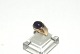Elegant lady 
ring with 
purple stone in 
8 carat gold
Stamped GIFA 
GIFA
Size 52
The check by 
...