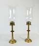 A pair of 
Hurricane 
candlesticks of 
brass and glass 
from the 1930s, 
both are in 
great vintage 
...