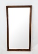 Mirror in 
rosewood of 
danish design 
from the 1960s.
74.5 x 39.5 x 
4 cm.
