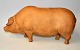 Large walking piggy bank, c. 1900, Denmark. Unglazed pottery. With coin toss in the back. With ...