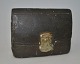 Money box in 
the form of a 
purse, painted 
clay, 19th 
century 
Denmark. L .: 
11.5 cm. H.:8.5 
cm. W ...