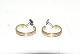 Georg Jensen 
Earrings in 18 
carat gold and 
white gold
Stamped GJ 750
Nice and well 
maintained ...