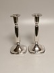 A pair of Swedish table tops of silver height 18cm. Appears in used condition.
