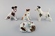 Four German porcelain figurines. Terrier and greyhound with puppies. 1960s.
