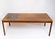 Coffee table in 
teak with brown 
ceramic tiles 
of danish 
design from the 
1960s. The 
table is in ...