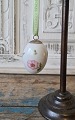 Royal 
Copenhagen 
Easter egg 
decorated with 
pink horn 
violet 
Height 6.5 cm.
Stock: 2