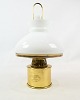 G. V. Harnisch 
oil lamp of 
brass with 
opaline shade 
by Holmegaard 
from the 1960s. 

36 x 25 cm.