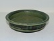 Royal 
Copenhagen art 
pottery, green 
bowl.
It is marked 
with number 
18/58.
Factory ...