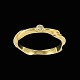 Georg Jensen. 
18k Gold 
Solitaire Ring 
with Diamond 
0.04ct
0.04 Ct. 
brilliant cut 
diamond Top ...