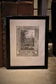 Decorative French 1800 century print with floral motif framed in old black painted wooden frame ...