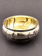 Silver bowl, obliquely bent