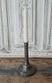 1800s tin 
candlestick
Height 18.5 
cm.