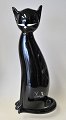 A black Siamese 
cat, 20th 
century Formia 
Vetri De 
Murano, Italy. 
Solid black 
glass mass. 
Signed. ...