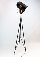 Floor lamp, model Carronade, by Le Klint. The lamp is of black metal and teak. H - 168 cm, W - ...