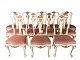 Set of 12 
Rococo dining 
room chairs of 
white painted 
wood decorated 
with leaf gold 
and ...