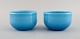 Michael Bang 
for Holmegaard. 
Two Palet bowls 
in light blue 
mouth blown art 
glass. Mid-20th 
...