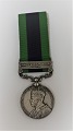 India General 
Service Medal 
1908-1935, 
Waziristan 
1919-21. 
Engraved on the 
edge 28 SOWAR 
KHAZAN ...