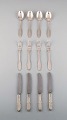 Evald Nielsen 
number 14 
dinner service 
in hammered 
silver (830) 
for four 
people. ...