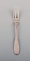 Evald Nielsen 
number 14 lunch 
fork in 
hammered silver 
(830). 1920s. 
13 pcs in 
stock.
Length: ...
