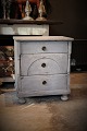 Swedish 1800 century mini chest of drawers in painted wood with 3 drawers and 
fine patinated gray color. H:62cm. W:54cm. D:36,5cm.