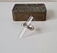 Ring in punched 
sterling silver 
with zircon by 
Hans Henrik 
Nygaard
Stamped: 925 - 
HHN
Ring size 50