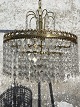 Chandelier with 
glass prisms, 
25cm diameter, 
25cm height 
*Nice 
condition*