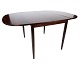 Dining table in 
rosewood with 
extensions 
designed by 
Arne Vodder 
from the 1960s. 
The table is in 
...