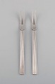 Sigvard Bernadotte for Georg Jensen. Two Bernadotte cold meat forks in sterling 
silver.
