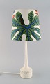 HANS-AGNE 
JAKOBSSON for A 
/ B MARKARYD. 
Table lamp with 
colorful shade 
in fabric by 
Josef Frank. 
...