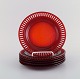 Monica Bratt for Reijmyre. Six plates in red mouth-blown art glass. 1950s / 60s.
