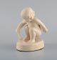 Adda Bonfils (1883-1943) for Ipsens Enke. Figur af pige med skovl i glaseret 
keramik. Modelnummer 889. 1920/30