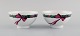 Two Royal 
Copenhagen 
Jingle Bells 
bowls decorated 
with spruce and 
ribbon.
Measures: 12 x 
6.5 ...