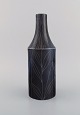 Mari Simmulson 
(1911-2000) for 
Upsala-Ekeby. 
Vase in glazed 
stoneware 
decorated with 
foliage. ...