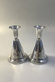Norway? Partly 
cone shaped 
Silver 
Candlesticks 
Measures H 13.5 
cm(5 5/16 in) 
Diam 8 cm(3 
5/32 ...