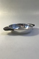 French Silver 
Dish (950) 
Wooden handles 
Measures  H 3 
cm (1 3/16 
in)Diam 12 cm(4 
23/32 in) ...