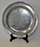 Pewter plate, 
18th century. 
London, 
England. 
Stamped 
Claridge, 
London. Dia: 
22.6 cm.