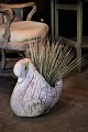 Old sandstone swan - pot for flowers with a nice patina.H:36cm. L:33cm. W:25cm.