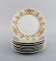 Bjørn Wiinblad for Rosenthal. Eight plates in porcelain with gold decoration. 
1980s.
