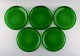 Kaj Franck (1911-1989) for Nuutajärvi. Five Luna dinner plates in green 
mouth-blown art glass. 1970s.
