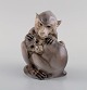 Christian Thomsen for Royal Copenhagen. Rare porcelain figure. To monkeys. 
1920s.
