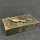 Length 4 cm.Charming old pendant shaped like a key to a pocket watch.Its center can be ...