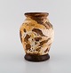 Louis Dage (1885-1961), French ceramist. Unique vase in glazed ceramics. 
Beautiful glaze in brown and light earth tones. 1930s.
