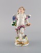 Antique Meissen figure in hand-painted porcelain. Chained cupid. Late 19th 
century.
